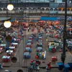 Vendors and shoppers at a busy Thai night market