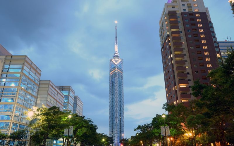 Fukuoka Tower rising over the seaside Momochi district at sunset