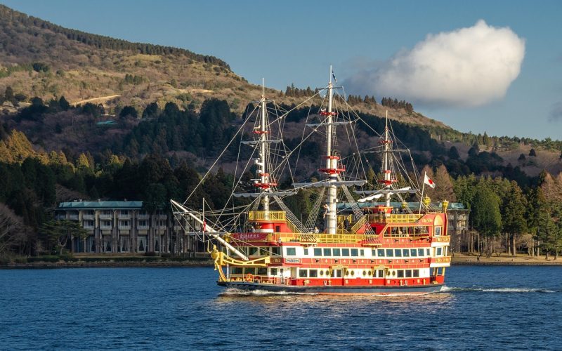 Lake Ashi in Hakone with a sightseeing pirate ship on calm water