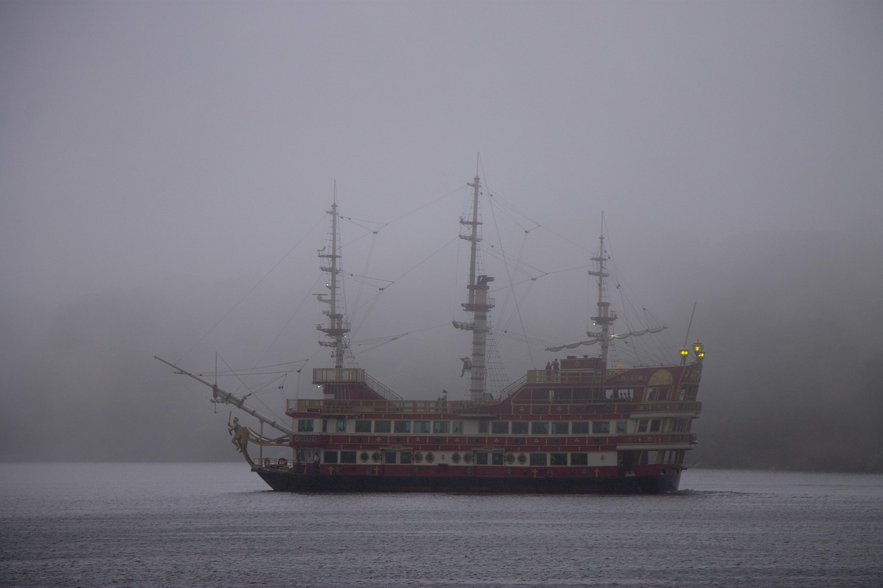 Lake Ashi in Hakone with a sightseeing pirate ship on calm water