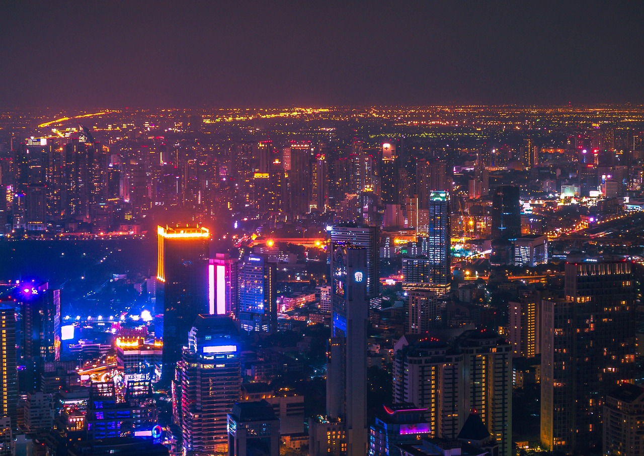 Bangkok city skyline glowing at night