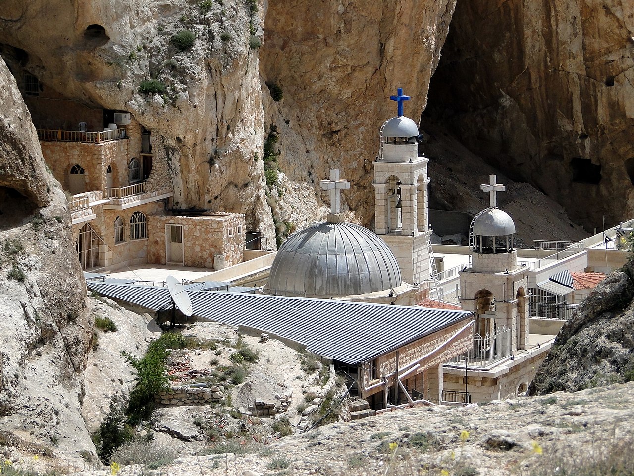 The convent of Mar Takla against the cliff