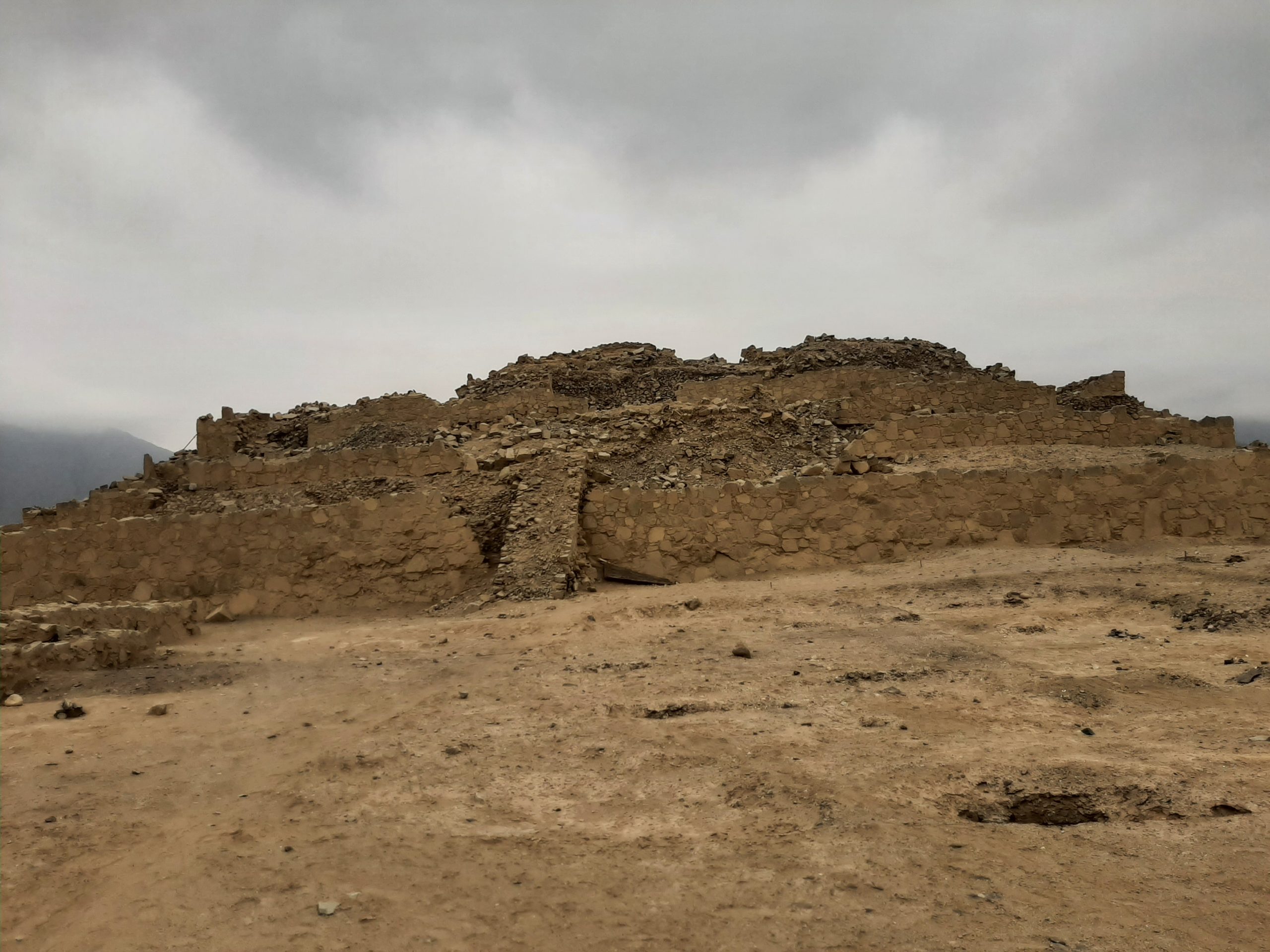 The terraced slope of a Caral pyramid