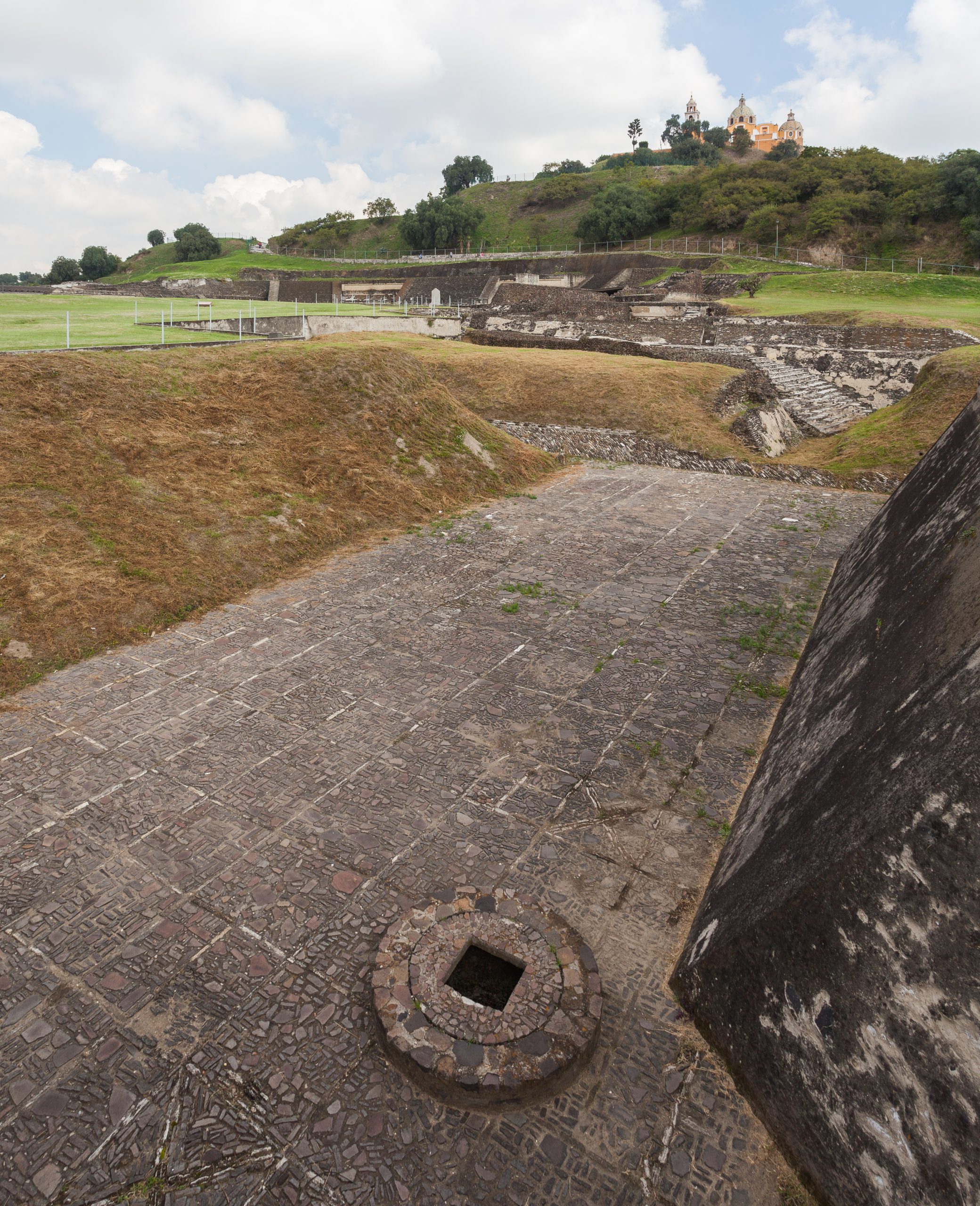 The grassy slope of the Cholula pyramid