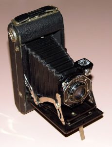 A vintage folding film camera