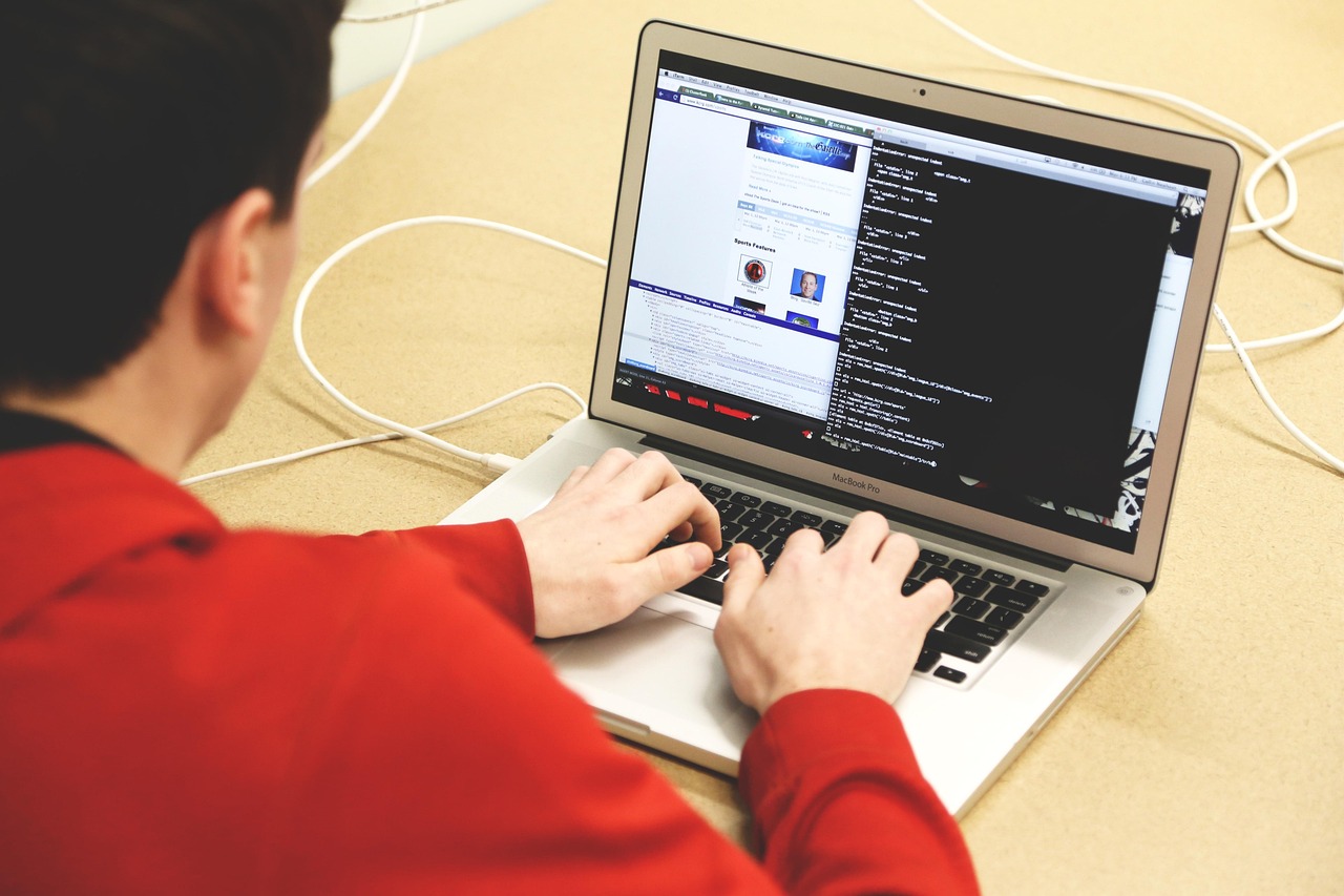 Programmer typing code during a work session