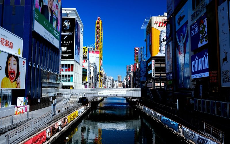 Neon signs reflected in the canal at Dotonbori, Osaka