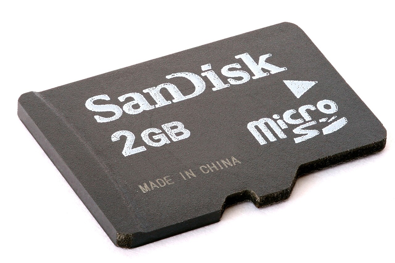 A tiny microSD memory card