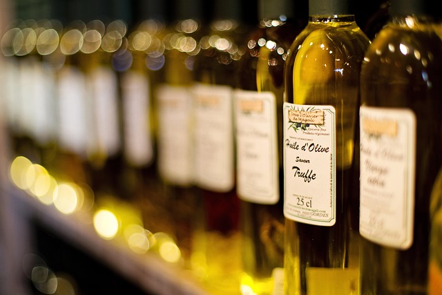 Olive oil being poured from a bottle