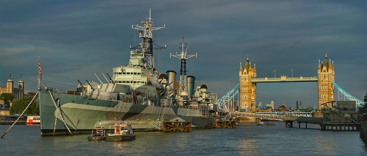 HMS Belfast near Tower Bridge at dusk