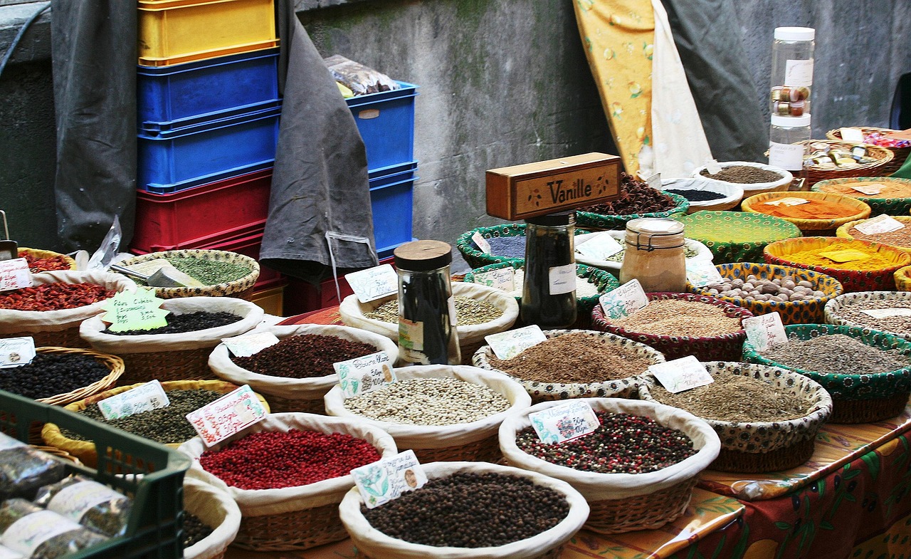 Spices piled high in a Middle Eastern market like those of Iraq