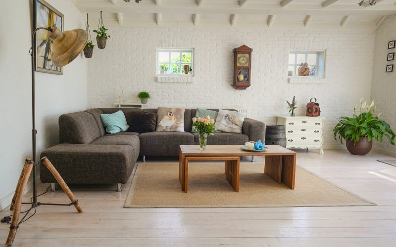 Bright layered lighting in a small living room