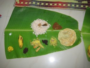 A Kerala sadya feast served on a banana leaf