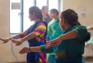 A classical Indian dancer in motion, an art form the Manipuri tradition refined