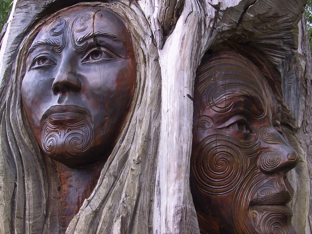 Detailed wood carving in the Maori style, an art form central to their culture