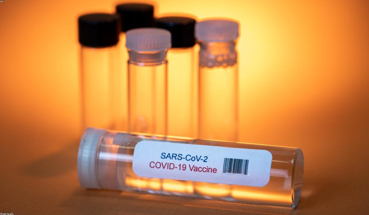 A vaccine vial and syringe