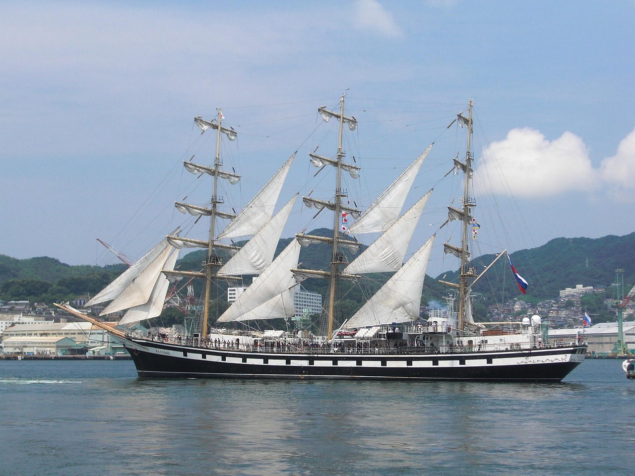 Nagasaki harbor with a sailing ship in the port, Japan