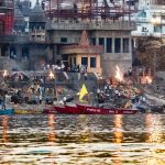 The ghats of Varanasi descending to the holy river Ganges, the spiritual heart of Hindu India