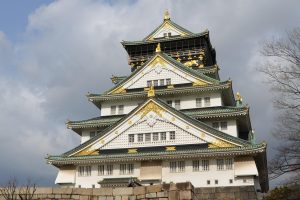 Osaka Castle main keep surrounded by trees