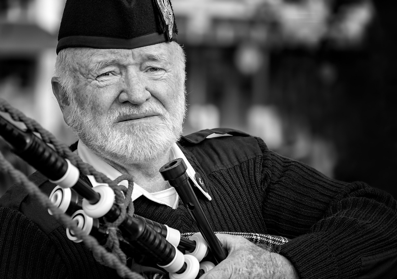 A piper in tartan, the bagpipes a symbol of Scottish tradition