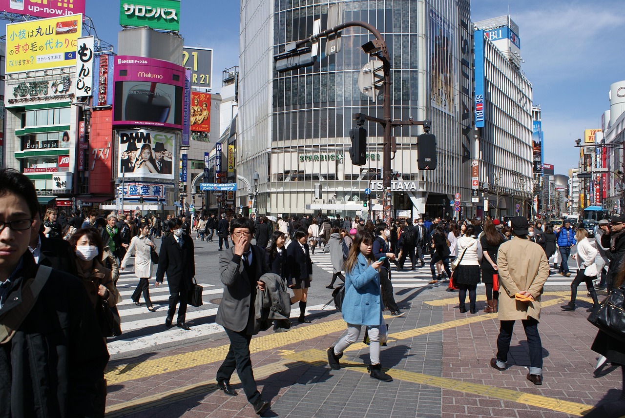 Crowds crossing the Shibuya scramble intersection in Tokyo