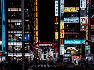 Neon-lit streets of the Shinjuku district in Tokyo at night