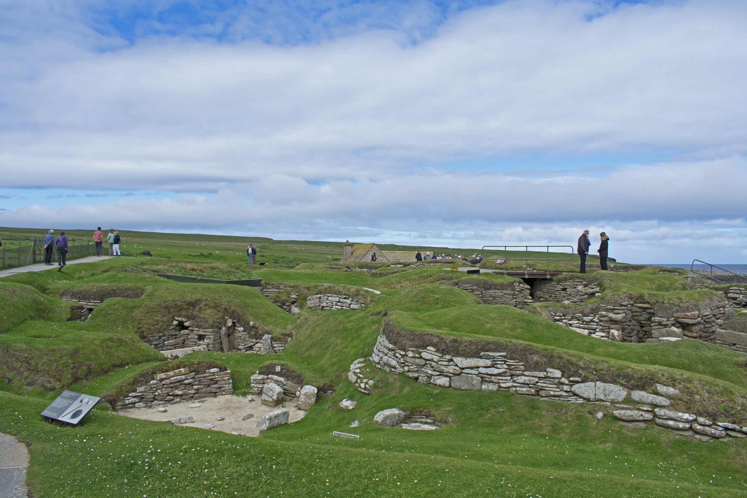 The cluster of stone houses at Skara Brae, built from local flagstone and linked by covered passageways.