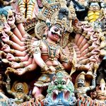 The towering, sculpture covered gopuram of the Meenakshi Temple in Madurai