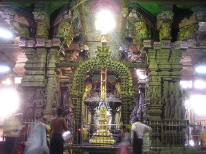 A great South Indian temple tower carved with countless figures of gods