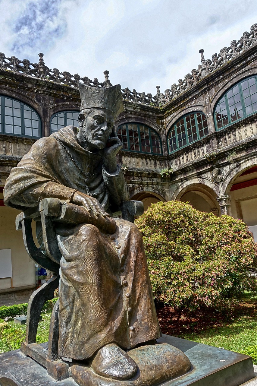 The Thinker statue in a contemplative pose