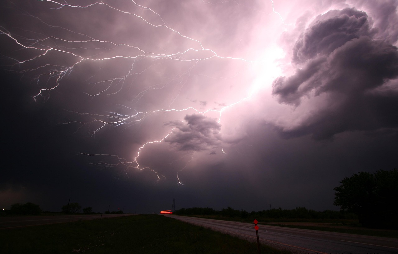 A bolt of lightning splitting a dark stormy sky