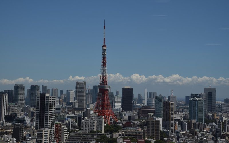 Tokyo Tower lit up against the city skyline