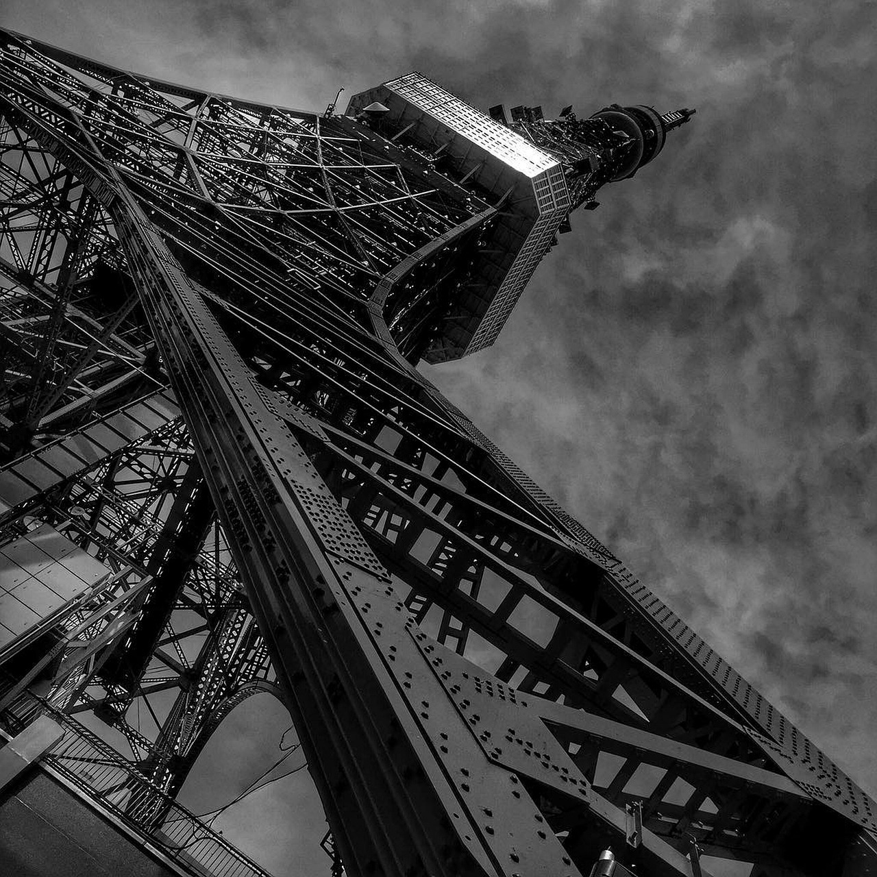 Tokyo Tower lit up against the city skyline