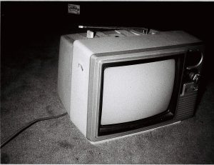 A vintage cathode-ray-tube television set