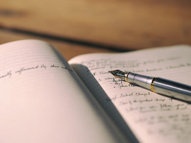A notebook and pen for writing