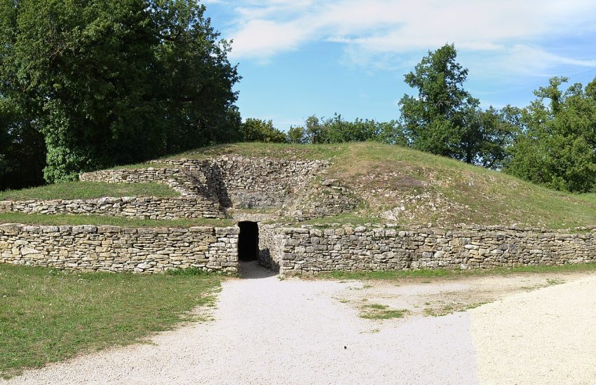 The stepped mound of Tumulus A rising from the Bougon necropolis