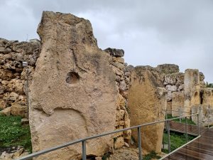 The temple complex nestled into the Gozo landscape under a wide sky