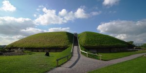 The great mound of Knowth rising above the Boyne Valley, ringed by smaller tombs