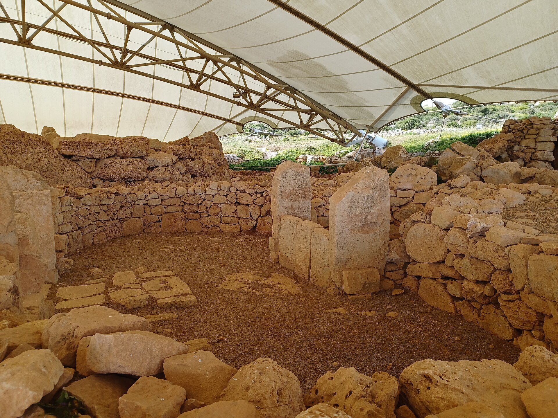 A stone-framed doorway leading into the interior of the temple
