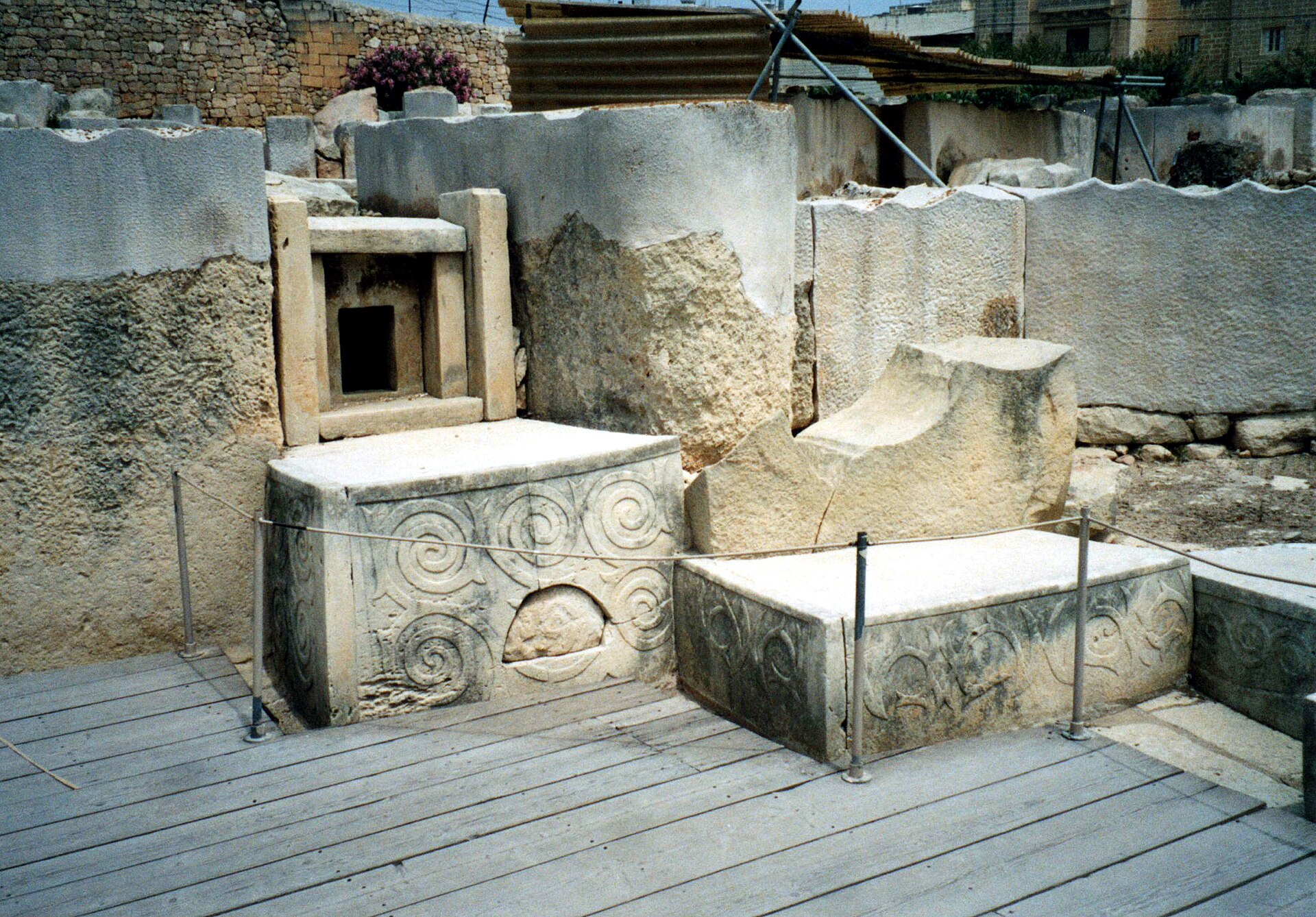 Spiral carvings decorating a stone screen within the temple