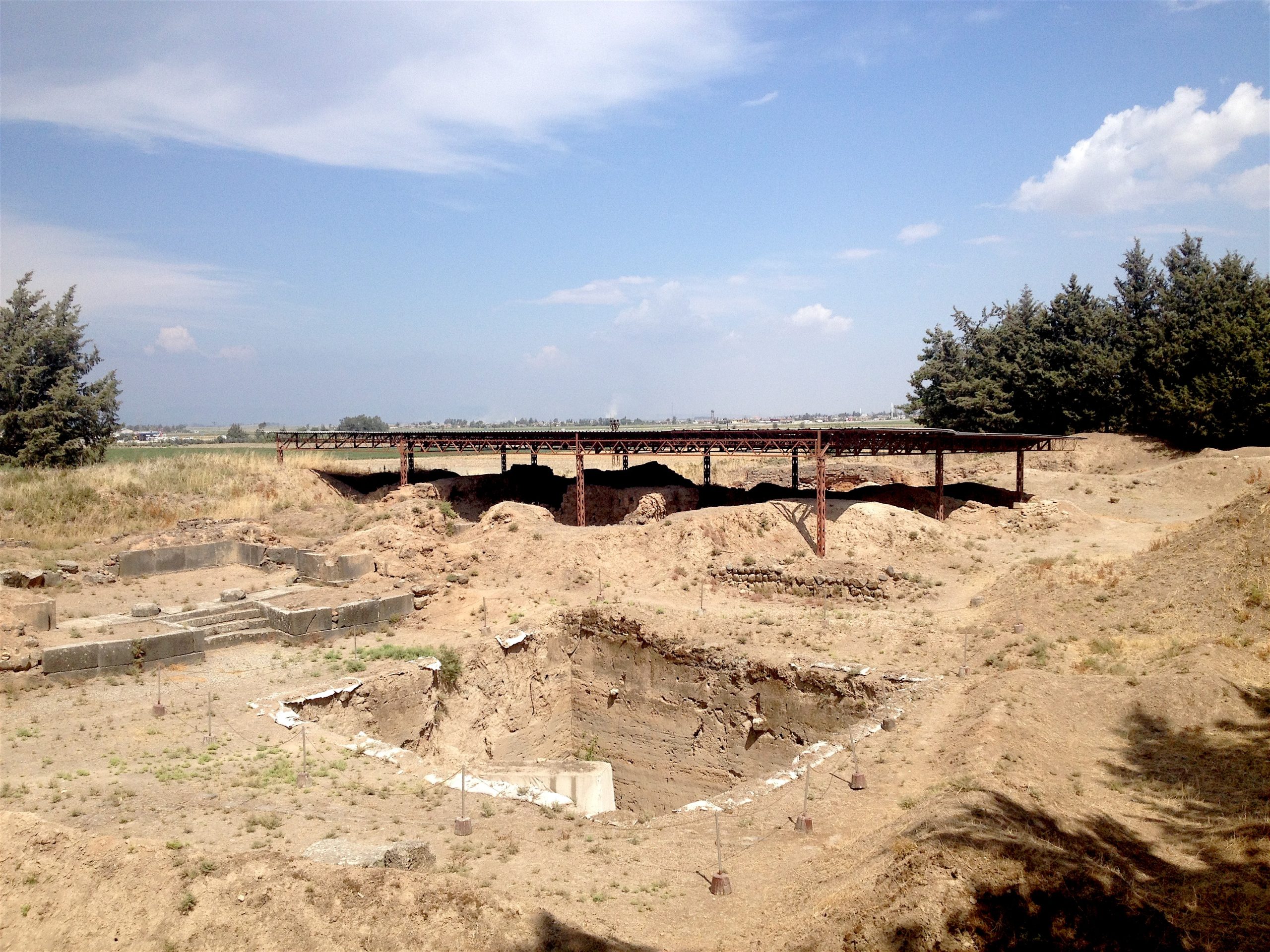 Trenches and mudbrick walls exposed at the archaeological site of Alalakh