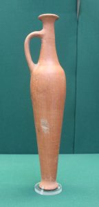 A red burnished flask from Alalakh in a museum collection