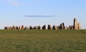 The monument seen along its length, prow pointing to the horizon