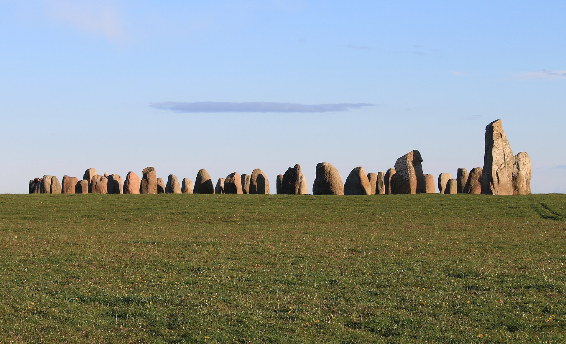 The monument seen along its length, prow pointing to the horizon