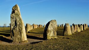 The stones in winter, snow gathered at their feet