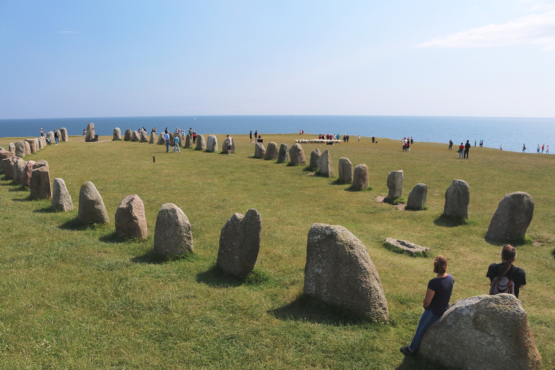 The oval of standing stones stretching along the ridge