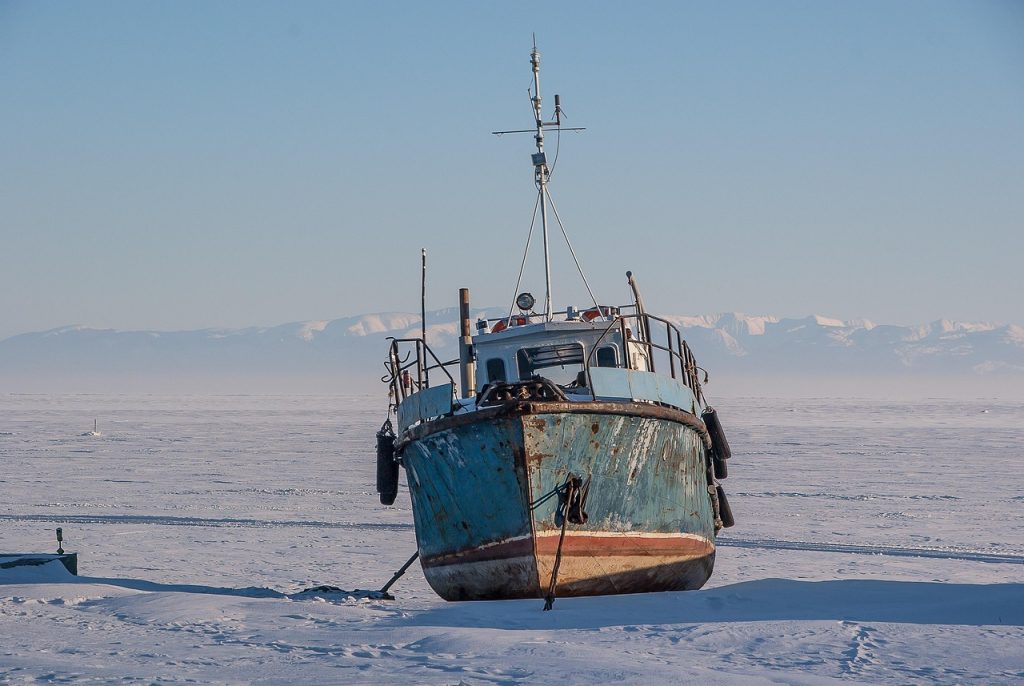 The frozen lake and the mountains of the Buryat land