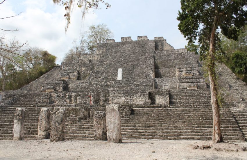Structure II pyramid rising above the jungle canopy at Calakmul Mexico