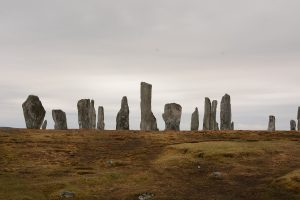 The tall central monolith rising above the surrounding ring