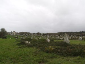 The stones of Carnac, some as tall as a person, others far larger